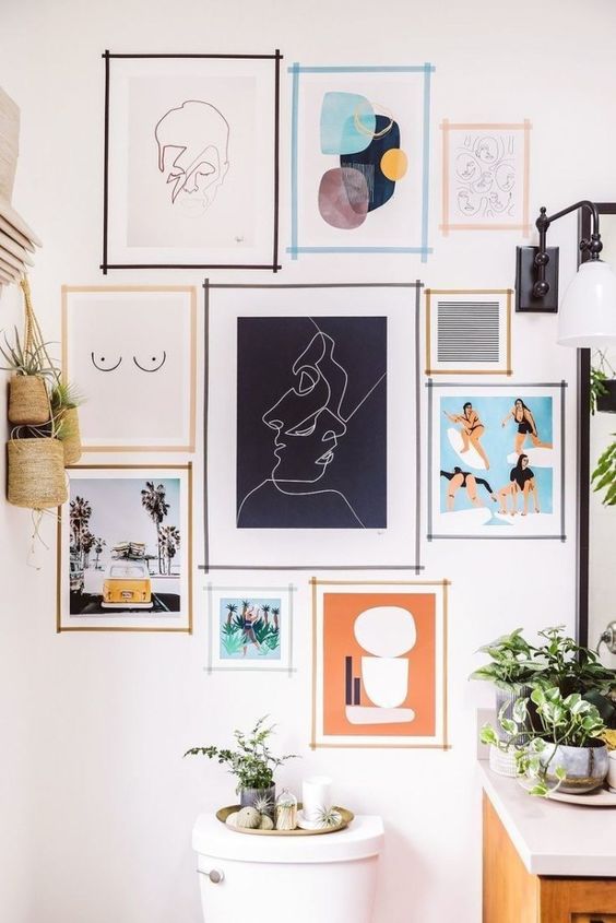 12 Ways To Display Your Gallery Wall - Taped Wall
