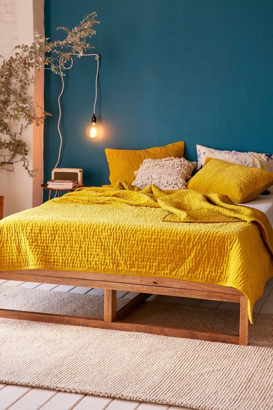 10 Rooms With Colour Done The Right Way! Teal-Backdrop-Bedroom-with-Yellow-Bed-Spread