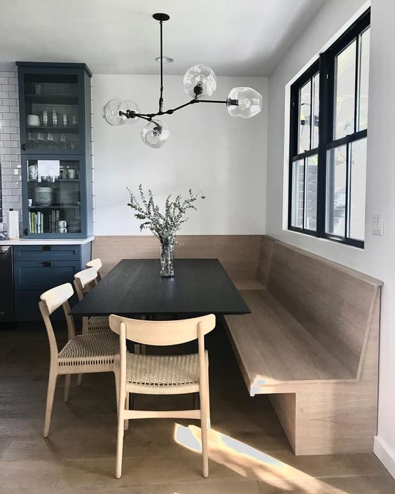 October Pinterest favs - Scandinavian kitchen banquette and globe branch light fixture