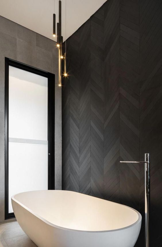 Black herringbone feature wall bathroom