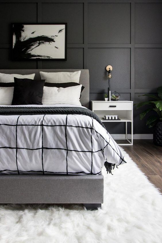 Black square panelled bedroom wall interior