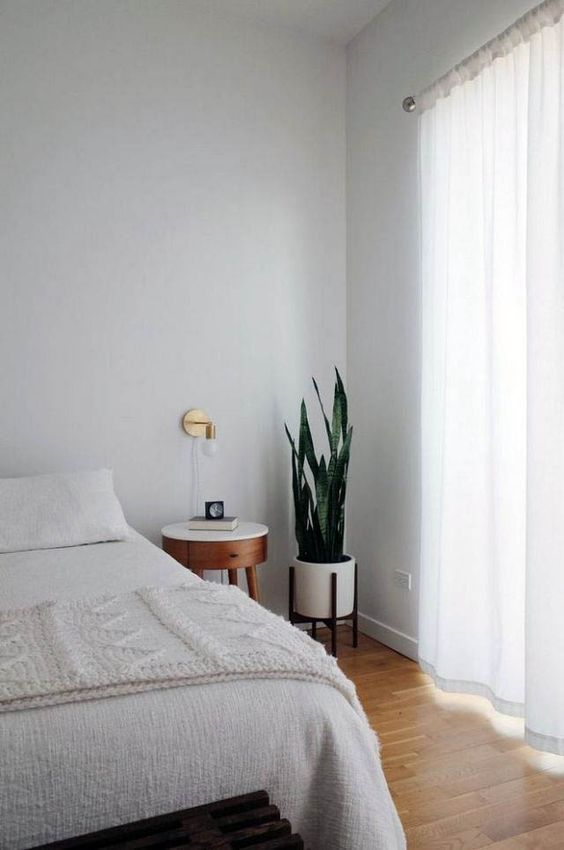 9 Tricks To Make A Small Bedroom Look & Feel Larger - Keep The Floor Clear